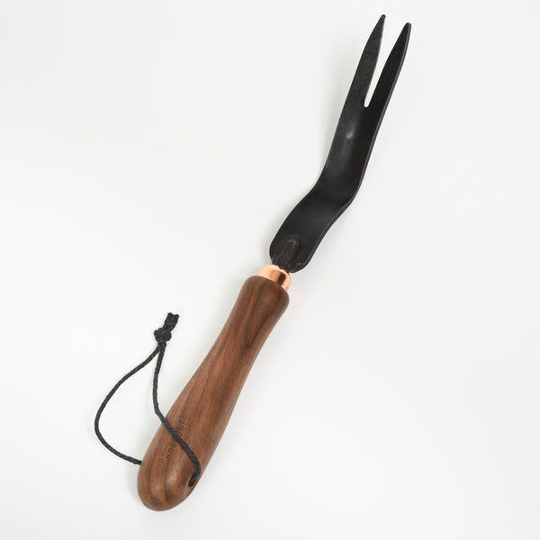 Steel weeding fork with wooden handle