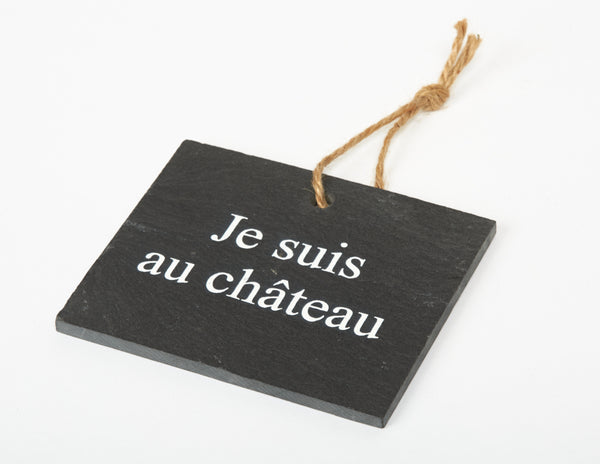 Slate label "Je suis au Château"